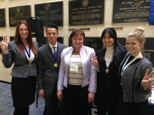 Pictured left to right: Ami Hazel, Michael Dinh, Kathy Walton (Collegiate DECA, Texas State Advisor), Grace Brann, Khiet Lam