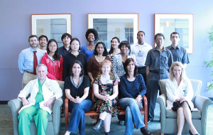 Front row seated: From left - Dr. Gregory Reece, Dr. Michelle Fingeret, Dr. Mia K. Markey, and Dr. Fatima Merchant. Second row: Dr. Scott Cantor (first on left) and Dr. K. Ravi-Chandar on far right with the rest of the multi-disciplinary, multi-institutional team members.