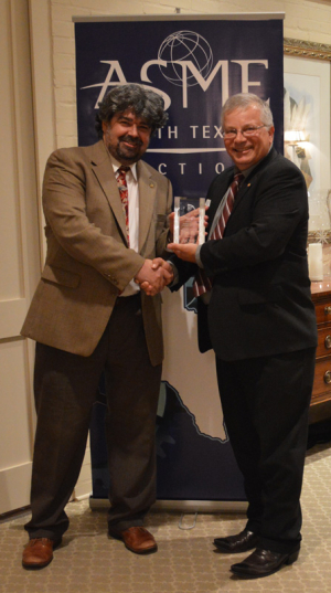 Photo: George Rissky, Chair of the ASME South Texas Section presented the award to Raresh Pascali during the awards banquet on April 20.