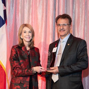 Paula Myrick Short, Senior Vice President for Academic Affairs and Provost presents Dr. Heidar Malki with Global Faculty award at the Faculty Awards Dinner, an annual event recognizing the extraordinary talents and gifts of our faculty.