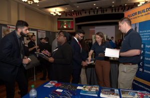 College of Technology Students speak with recruiters at an in-person Career Fair in 2019